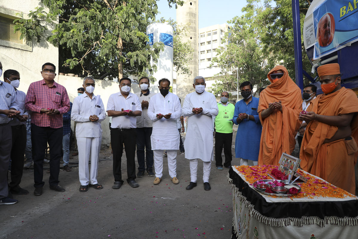 Sadhus and community leaders pray for the well-being of all