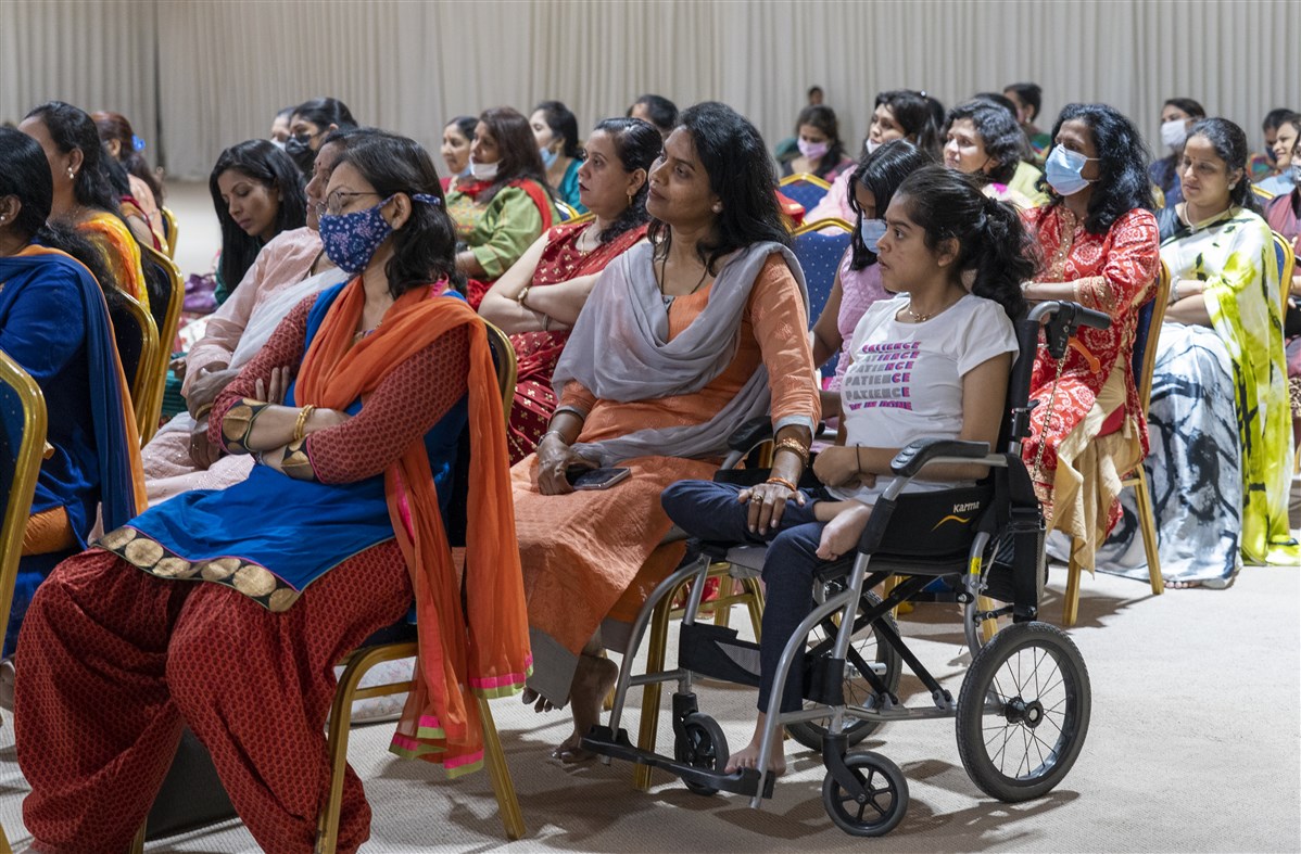 Devotees listening to discourses