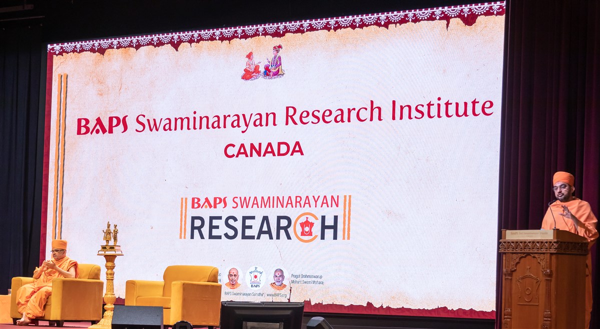 Pujya Gunsagardas Swami, Head of the BAPS Shri Swaminarayan Mandir, Toronto, addresses the assembly