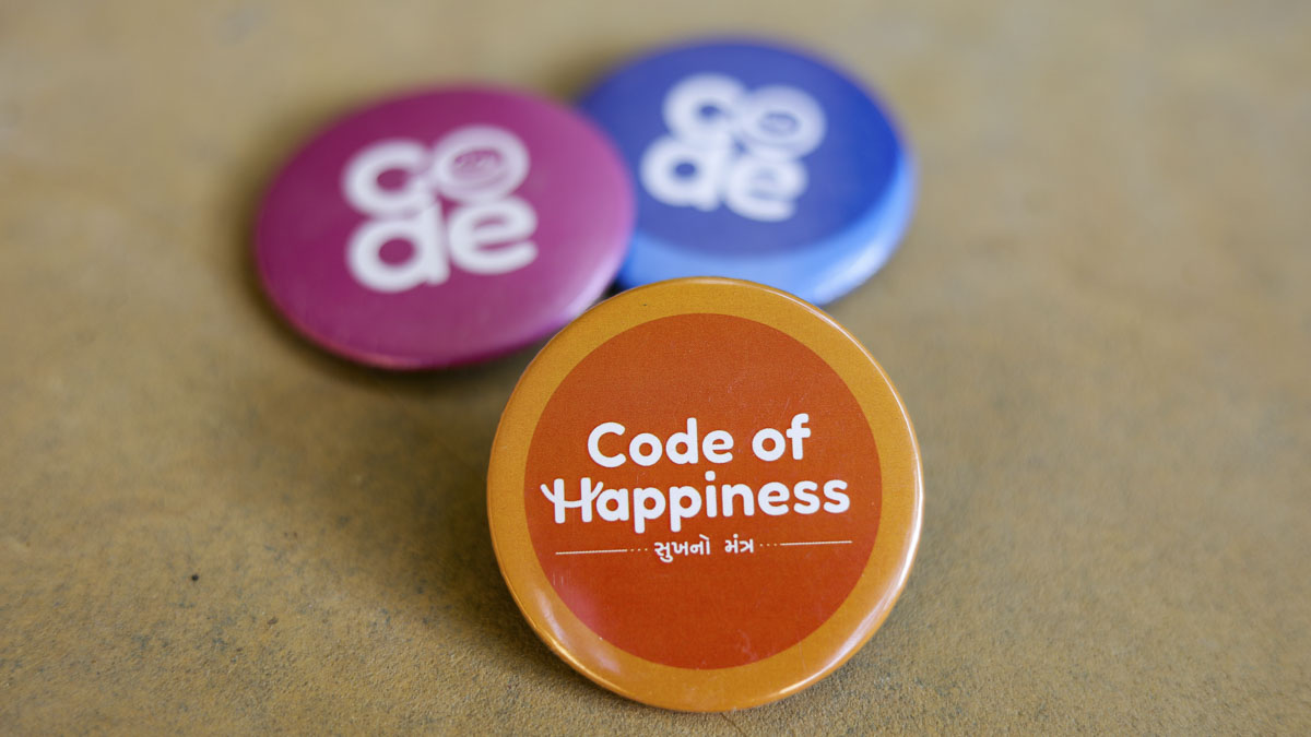 Badges for the ‘Code of Happiness’ convention