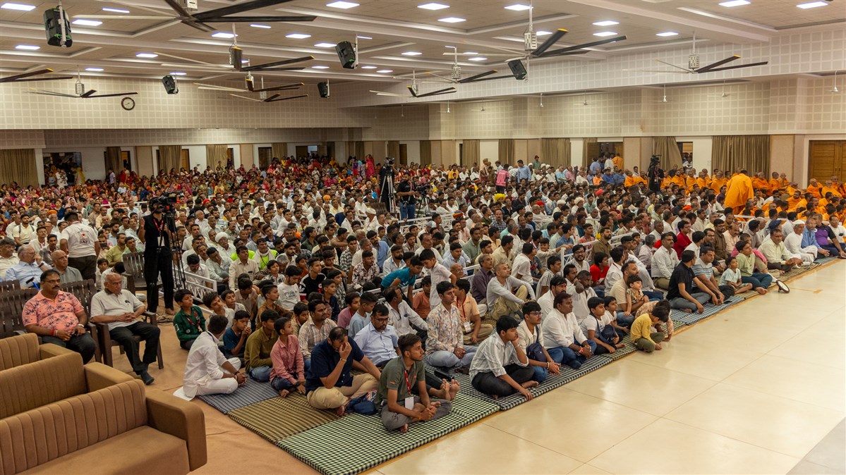 Swamis and devotees during the assembly