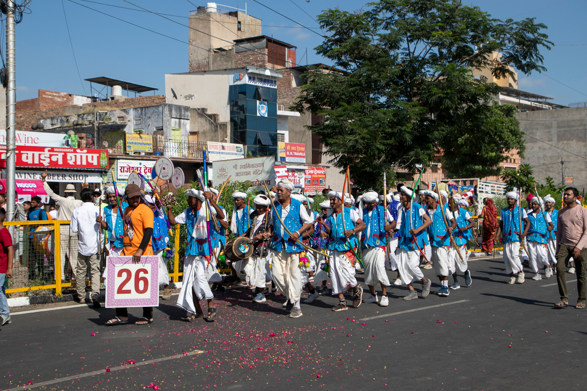 Tribal devotees perform a tribal dance